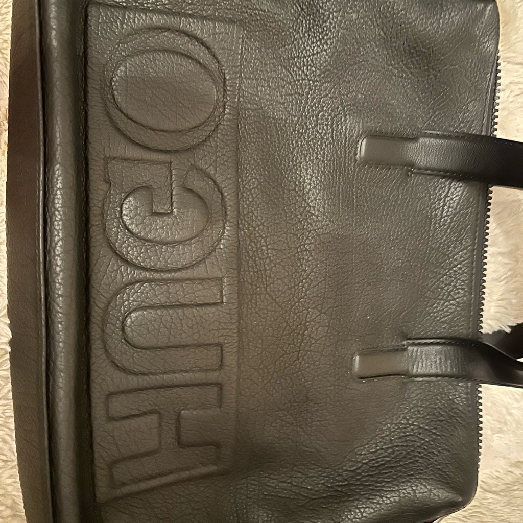 Hugo Black Leather Duffel Bag With Structured Design